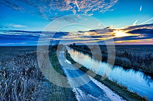 Scenic view of a beautiful sunset over a frozen lake