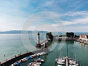 Scenic view of boats at the harbor entrance of Lindau at lake Constance in Germany