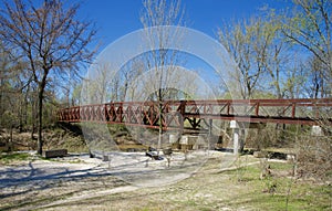 Scenic view of a Bridge over a wooded area.