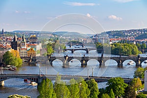 Scenic view of bridges on the Vltava river and of the historical center of Prague