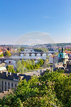 Scenic view of bridges on the Vltava river and of the historical center of Prague