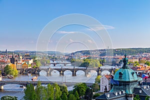 Scenic view of bridges on the Vltava river and of the historical center of Prague