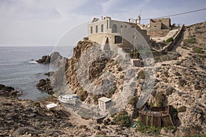 Scenic view of a building located on the top of a cliff in Cabo de Gata, Spain