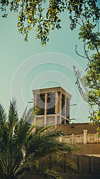 Scenic view of a building surrounded by palms in Al Fahidi Historical Neighbourhood, Dubai.