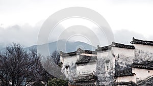 Scenic view of buildings situated near a few trees: Hongcun, China