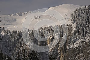 Scenic view of Carpathian Mountains during the winter with cabins or various human settlements