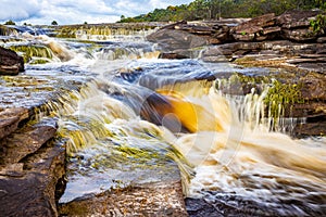 Scenic view of Carrao river current at Canaima national park photo