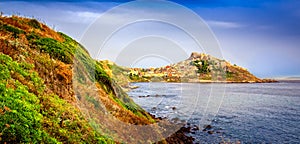 Scenic view of Castelsardo town and ocean landscape