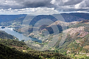 Scenic view of Cavado river and Peneda Geres National Park in northern Portugal photo