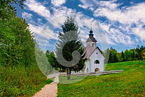 Scenic view of church of the Holy Spirit on the southern side of the Bohinj Lake, near road Ribcev Laz - Ukanc, Slovenia