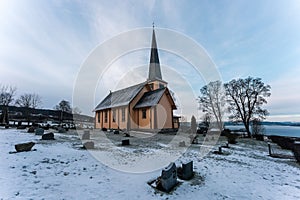 Scenic view of a church in a snowy landscape in winter in Toten, Norway