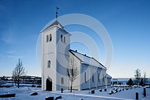 Scenic view of a church in a snowy landscape in winter in Toten, Norway