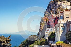 Scenic view of colorful houses on Capri island with Vesuvio background photo