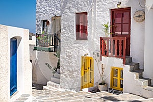 Scenic view of colorful street in traditional Greek cycladic vil