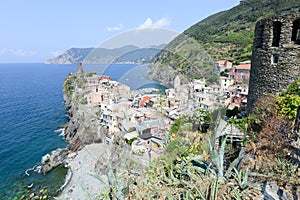 Scenic view of colorful village Vernazza and ocean coast