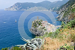 Scenic view of colorful village Vernazza and ocean coast