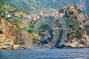 Scenic view of colorful village Vernazza and ocean coast