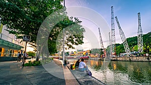 Scenic view of Singapore River at Clarke Quay during sunset.