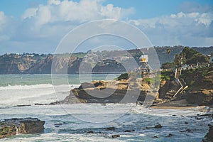 Scenic view of a cove with a beach full of cliffs in La Jolla, San Diego, CA, USA