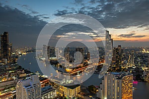 Scenic view curved of the Chao Phraya River in Bangkok city downtown during twilight, capital of Thailand