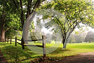 Early autumn foggy morning landscape photo