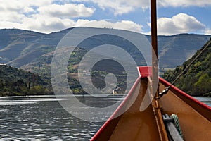Scenic view of the Douro River and the Douro Valley from a rabelo boat, in Portugal photo
