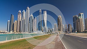 Scenic view of Dubai Marina Skyscrapers with boats timelapse hyperlapse, Skyline, View from sea, United Arab Emirates