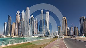 Scenic view of Dubai Marina Skyscrapers with boats timelapse hyperlapse, Skyline, View from sea, United Arab Emirates