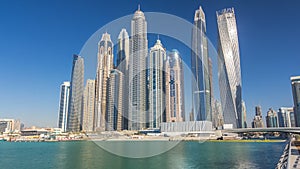 Scenic view of Dubai Marina Skyscrapers with boats timelapse, Skyline, View from sea, United Arab Emirates