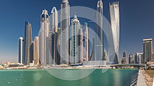 Scenic view of Dubai Marina Skyscrapers with boats timelapse, Skyline, View from sea, United Arab Emirates