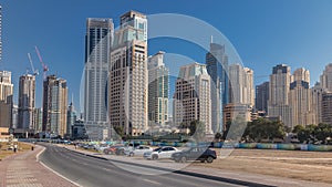 Scenic view of Dubai Marina Skyscrapers with cars , Skyline, View from sea, United Arab Emirates