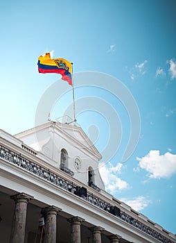 Scenic view of the Ecuadorian National flag on Carondelet Palace at Independence Square in Ecuador