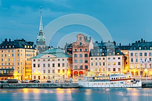 Scenic View Of Embankment In Old Part Of Stockholm At Summer Evening