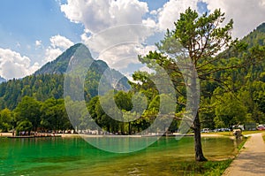 Scenic view of emerald water of Jasna lake near Kranjska Gora in Slovenia