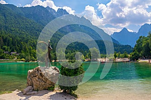 Scenic view of emerald water of Jasna lake near Kranjska Gora in Slovenia