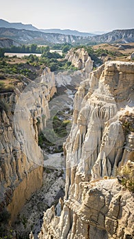 Scenic view of eroded rock formations in a desert landscape