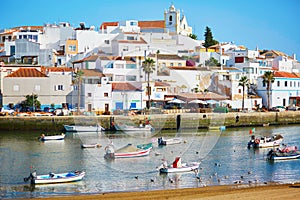 Scenic view of fishing boats in Ferragudo, Portugal