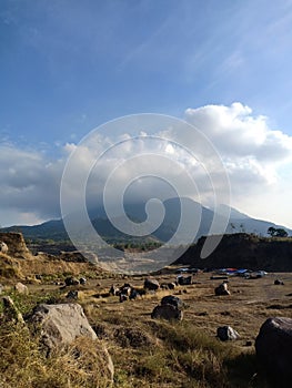 Scenic view of former mining excavations againts sky