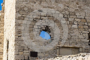 Scenic view of fortification walls of medieval Genoese fortress on Black Sea coast in the southern part of Feodosia city