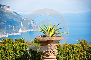 Scenic view of a garden terrace in Ravello overlooking Amalfi sea coast, Italy. Panoramic landscape
