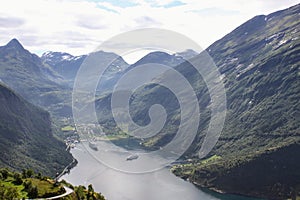 A scenic view of the Geiranger fjord in the SunnmÃ¸re region of MÃ¸re og Romsdal county in Norway.