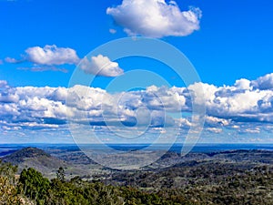 Scenic view with green hills and blue sky with white fluffy clouds 3. photo