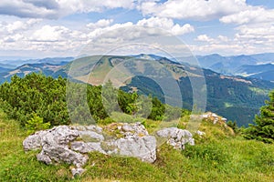 Scenic view of green mountains against the backdrop of a cloudy sky. Big Fatra mountains, Slovakia.