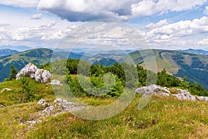 Scenic view of green mountains against the backdrop of a cloudy sky. Big Fatra mountains, Slovakia.