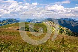 Scenic view of green mountains against the backdrop of a cloudy sky. Big Fatra mountains, Slovakia.