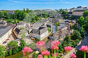 Scenic view of Grund district with old town and fortress in the background, in Luxemburg photo