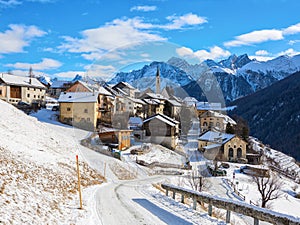 Scenic view on Guarda village at a beautiful sunny day in winter, Lower Engadine, Graubunden, Switzerland photo