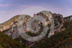 Scenic view of the hiking area Sentier Blanc-Martel with trees at sunset