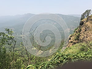 Scenic view of hills and mountains forest trees