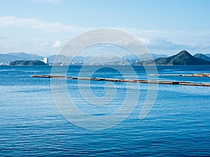 Scenic view of Hiroshima Bay and Hiroshima city skyline from Etajima island in Seto Inland Sea - Japan